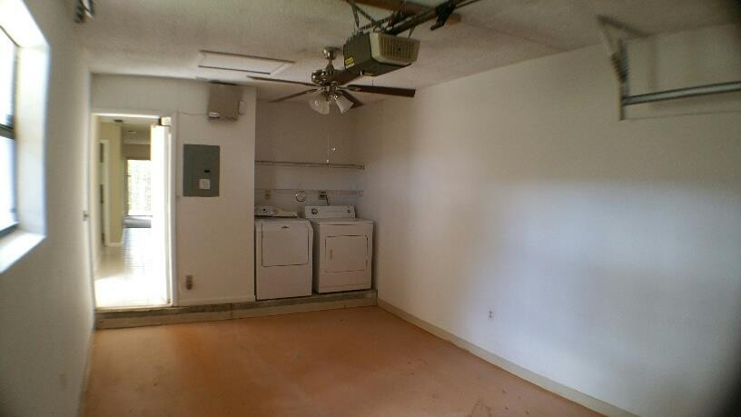 5282 Gate Lake Road, Unit 5282 Tamarac, FL 33319 - Photo 8 of 8 a view of a room with rack on the wall