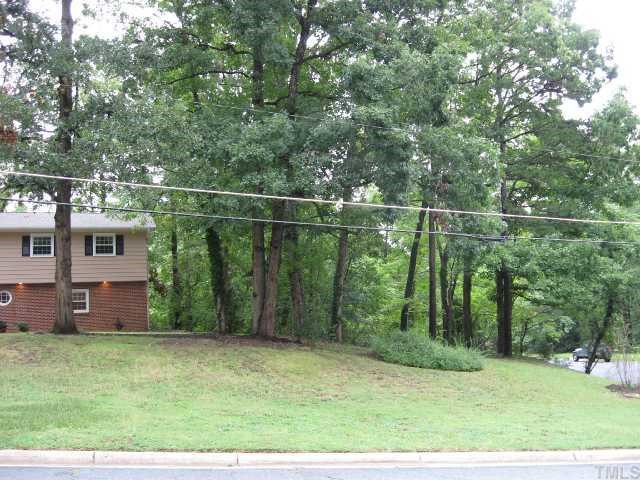 1402 Woodburn Road Durham, NC 27705 - Photo 9 of 9 Expansive side yard provides wonderful privacy! Grand old oak trees!
