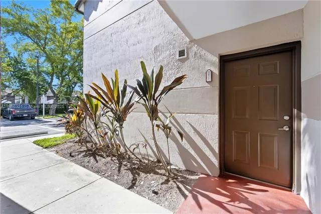 a view of a door front of a house