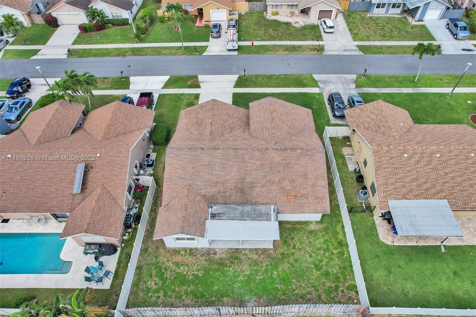 23098 Southwest 55th Avenue Boca Raton, FL 33433 - Photo 46 of 49 an aerial view of a house with outdoor space and street view
