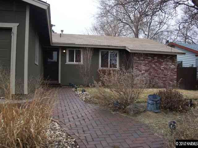 685 Nancy Circle Reno, NV 89503 - Photo 2 of 9 a front view of a house with garden