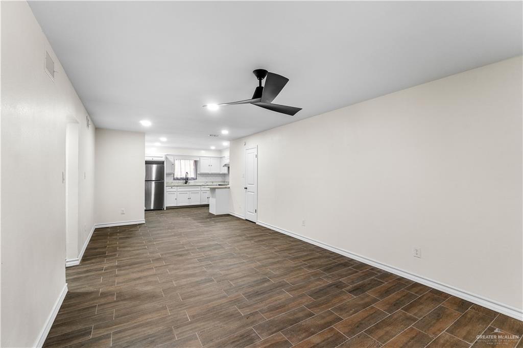 211 Gastel Circle, Unit 2 Edinburg, TX 78539 - Photo 6 of 22 a view of a kitchen with a sink and cabinets