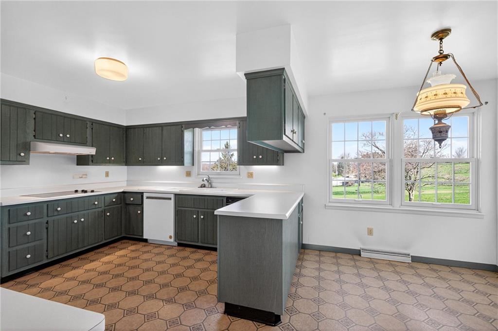 110 Spring Drive Apollo, PA 15613 - Photo 11 of 50 a kitchen with a sink cabinets and window