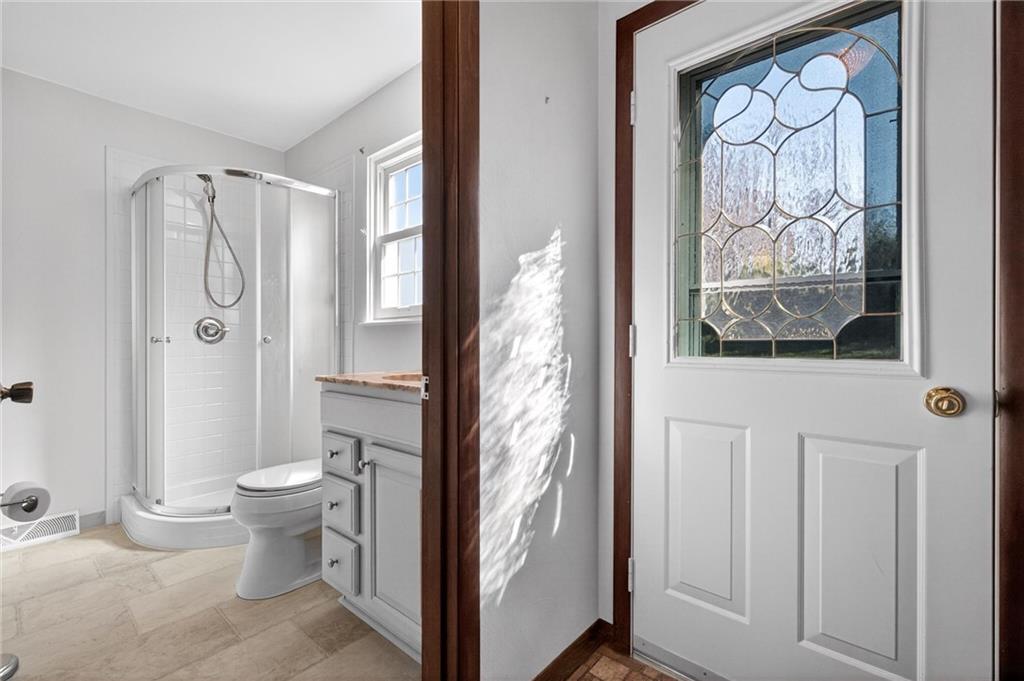 110 Spring Drive Apollo, PA 15613 - Photo 14 of 50 a bathroom with a shower toilet and sink