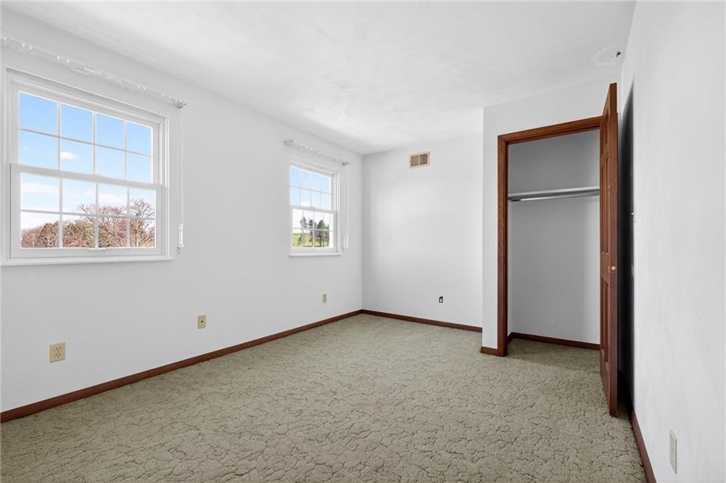 110 Spring Drive Apollo, PA 15613 - Photo 22 of 50 an empty room with windows and closet