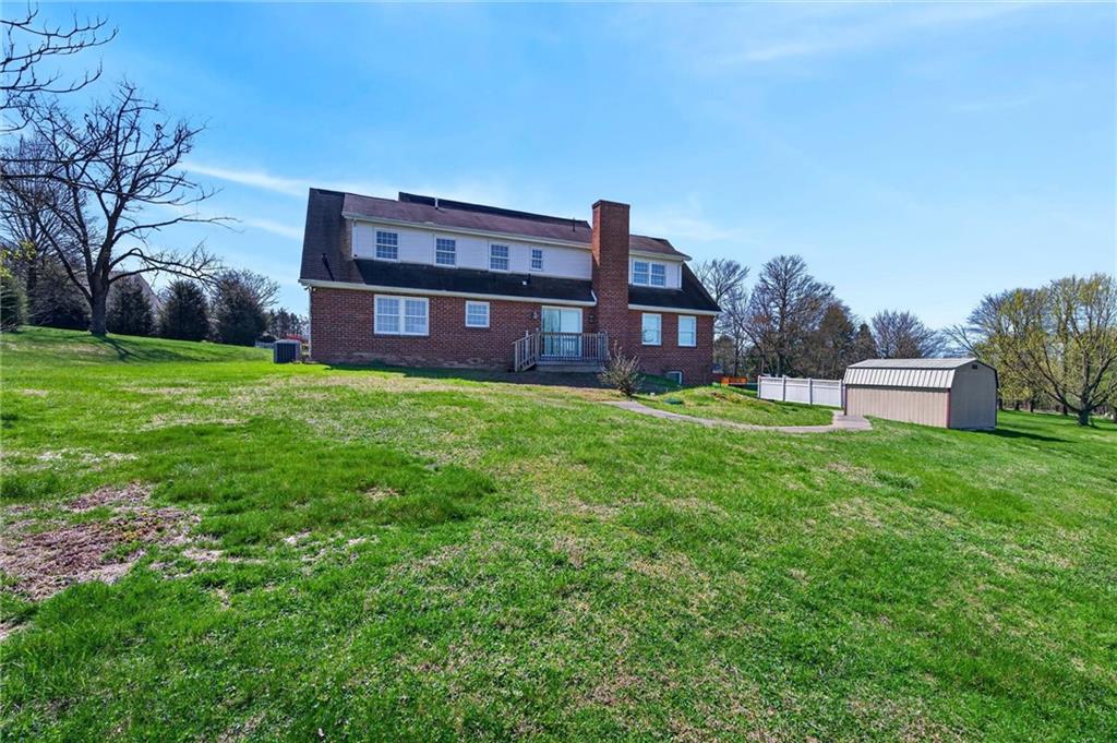 110 Spring Drive Apollo, PA 15613 - Photo 39 of 50 a view of a big house with a big yard and large trees