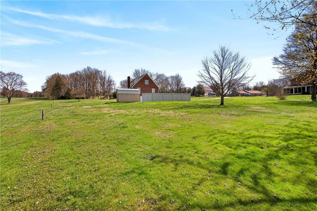 110 Spring Drive Apollo, PA 15613 - Photo 40 of 50 a backyard of a house with lots of green space and outdoor seating