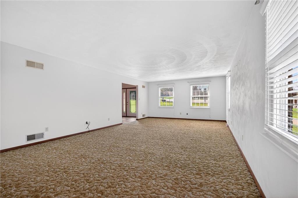 110 Spring Drive Apollo, PA 15613 - Photo 4 of 50 an empty room with windows
