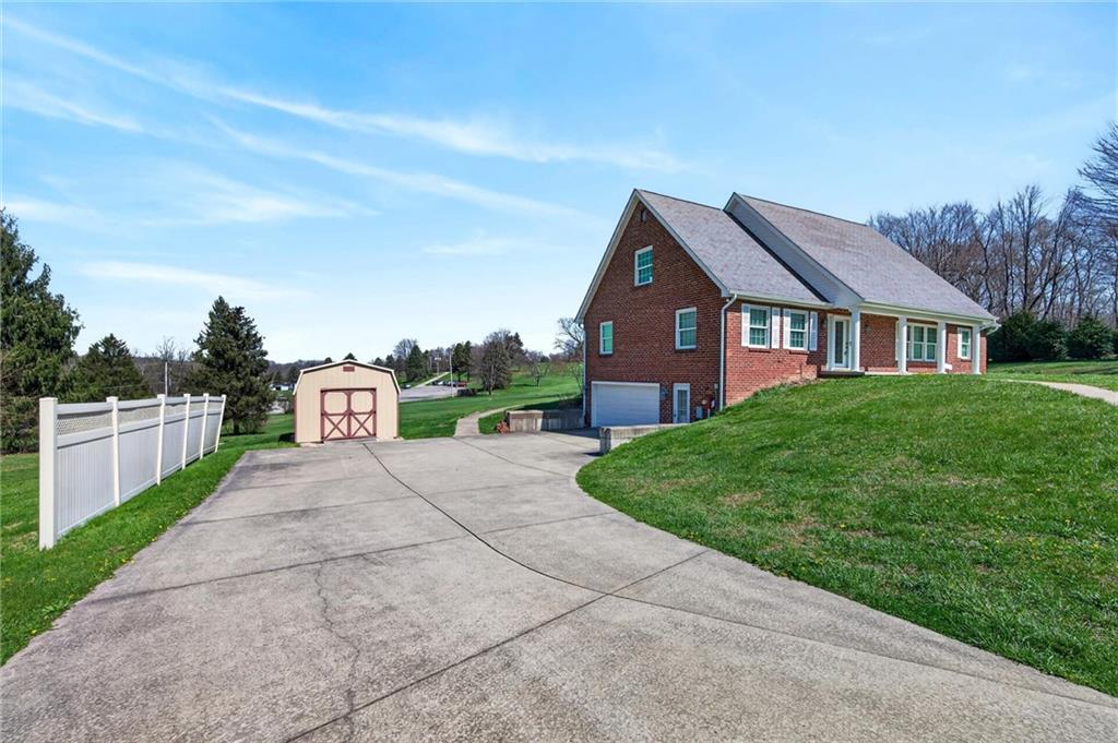 110 Spring Drive Apollo, PA 15613 - Photo 41 of 50 a view of a big house with a big yard and large trees