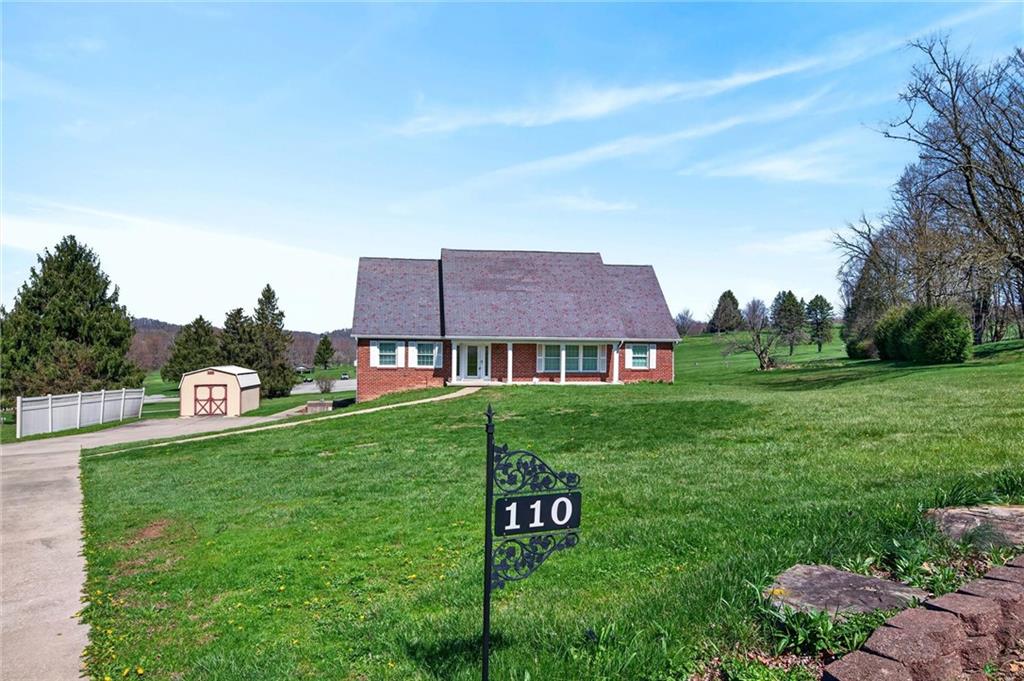 110 Spring Drive Apollo, PA 15613 - Photo 42 of 50 a view of a big house with a big yard potted plants and large tree