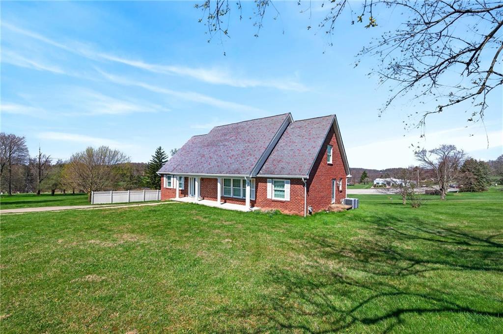 110 Spring Drive Apollo, PA 15613 - Photo 43 of 50 a aerial view of a house next to a big yard