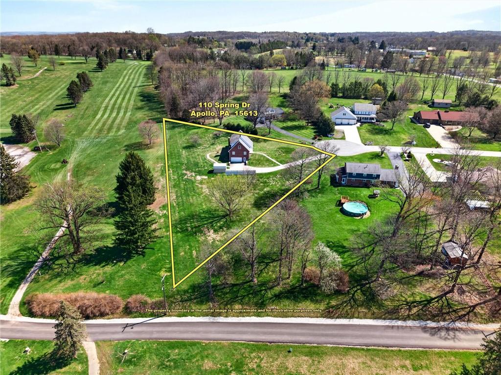 110 Spring Drive Apollo, PA 15613 - Photo 46 of 50 an aerial view of a house with a garden and swimming pool