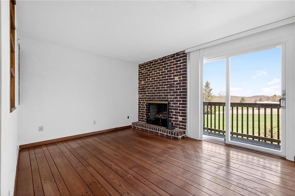 110 Spring Drive Apollo, PA 15613 - Photo 5 of 50 wooden floor in an empty room with a window