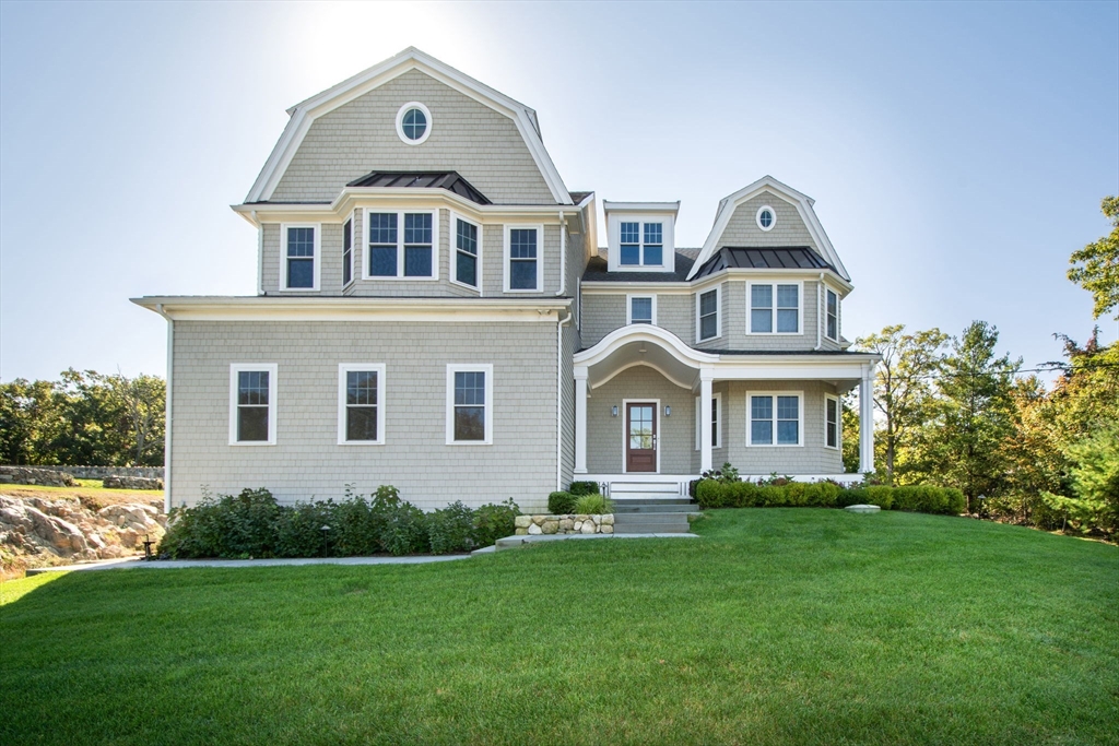 455 Clapp Road Scituate, MA 02066 - Photo 2 of 2 a front view of a house with a yard