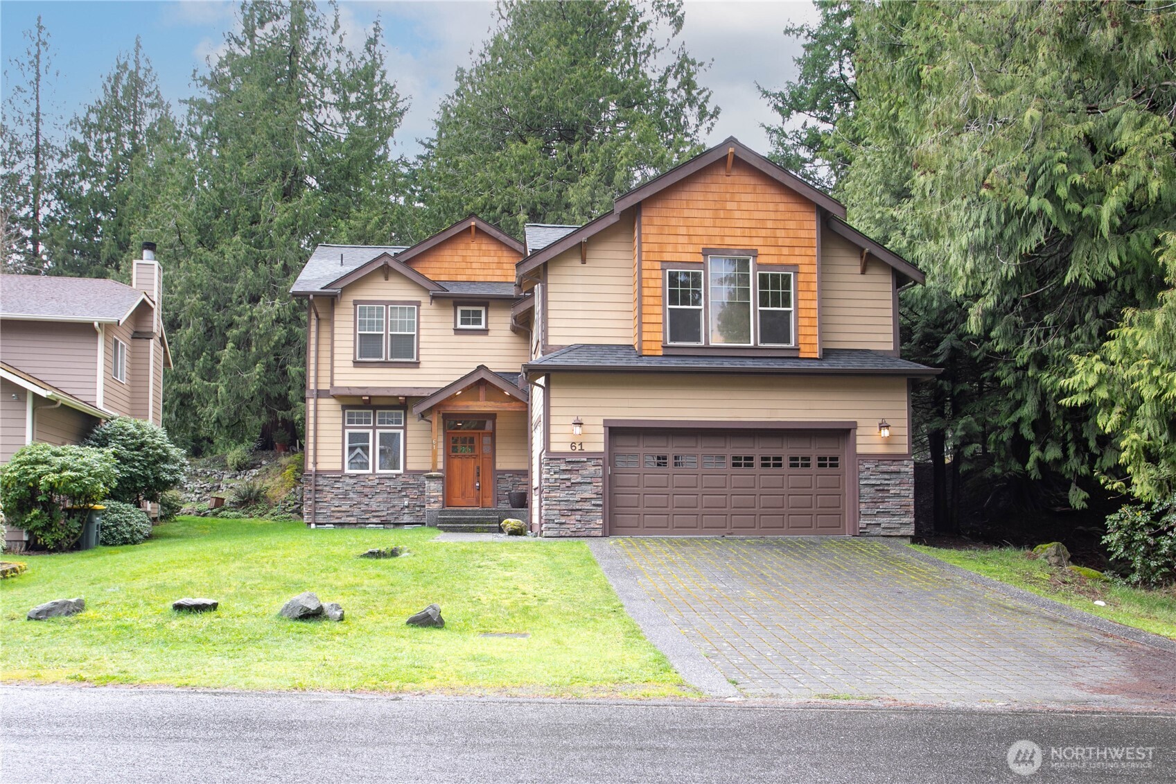 61 Windward Drive Bellingham, WA 98229 - Photo 1 of 36 a front view of a house with garden