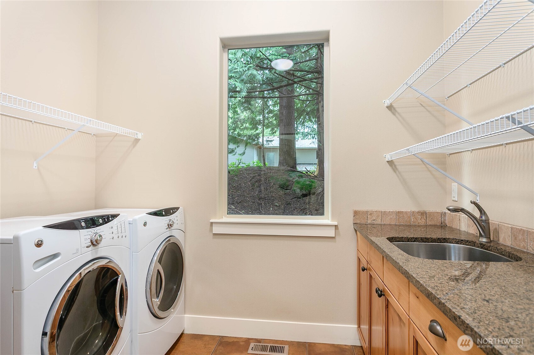 61 Windward Drive Bellingham, WA 98229 - Photo 18 of 36 a utility room with dryer and washer