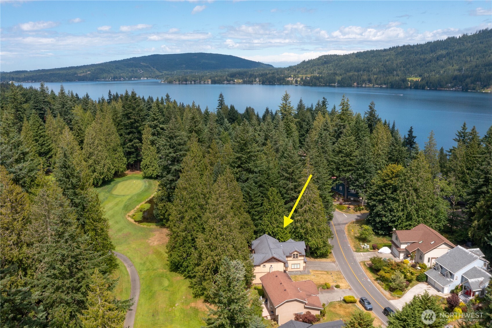 61 Windward Drive Bellingham, WA 98229 - Photo 36 of 36 a view of a lake with a mountain in the background