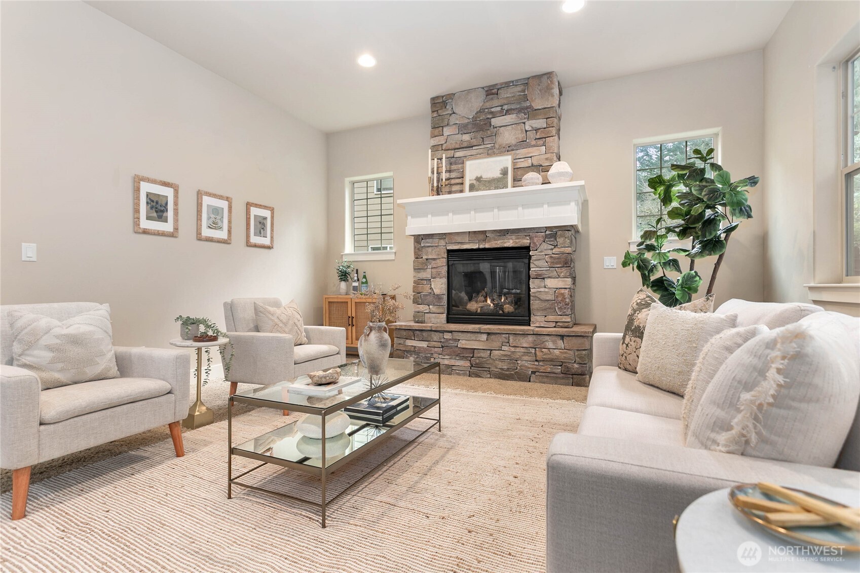 61 Windward Drive Bellingham, WA 98229 - Photo 4 of 36 a living room with furniture and a fireplace
