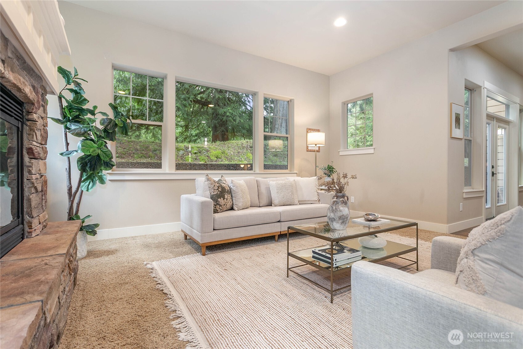 61 Windward Drive Bellingham, WA 98229 - Photo 5 of 36 a living room with furniture and a large window