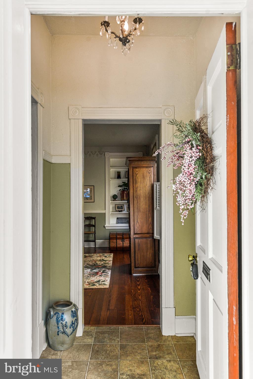 321 East 3rd Street Frederick, MD 21701 - Photo 5 of 23 The foyer beckons you to enter.