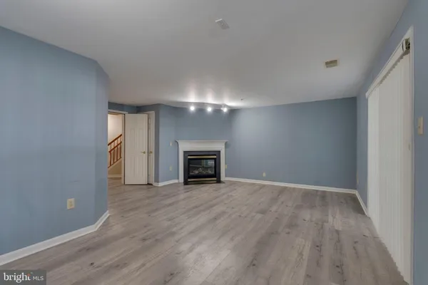 a view of room with hardwood floor