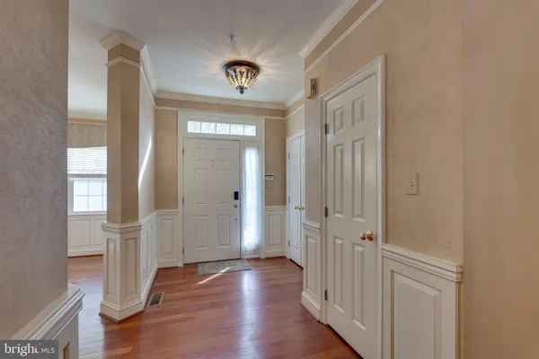 a view of a kitchen from the hallway