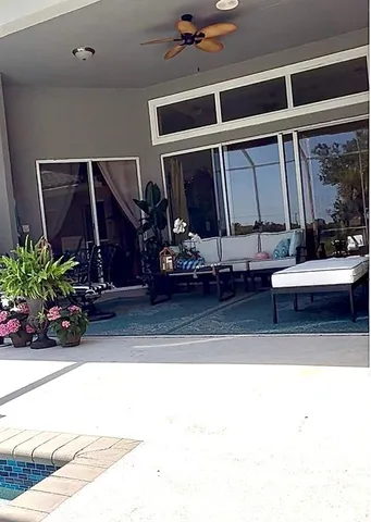 a view of living room filled with furniture