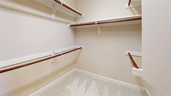 a view of a room with rack on the wall