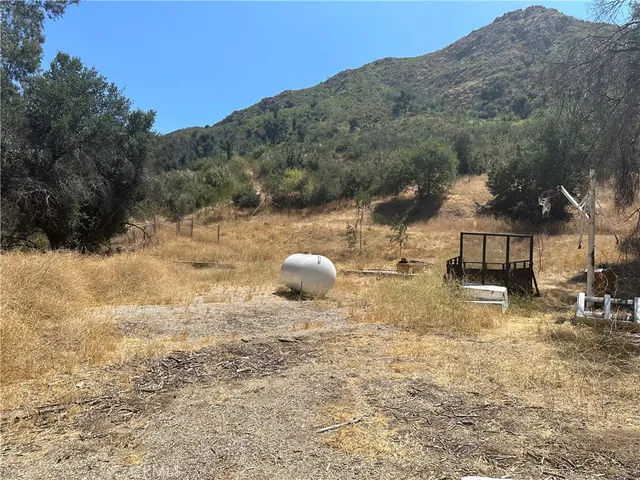 a view of a lake with mountains in the background
