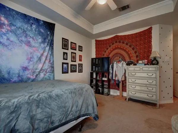 a bedroom with a bed and furniture