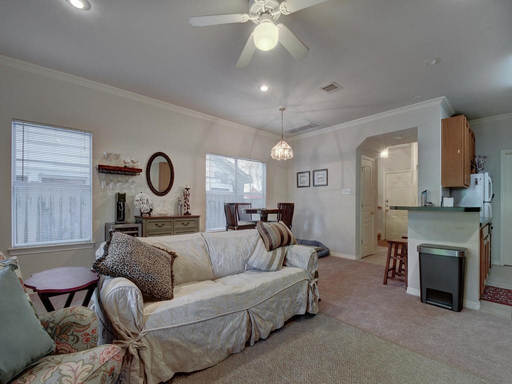 609 East 49th Street, Unit B Austin, TX 78751 - Photo 4 of 19 a living room with furniture and a fireplace