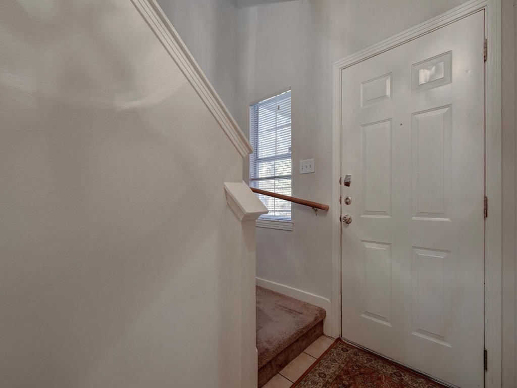 609 East 49th Street, Unit B Austin, TX 78751 - Photo 10 of 19 a bathroom with a glass shower door