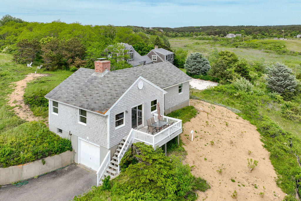 2 Ryder Hollow Road Truro, MA 02666 - Photo 29 of 33 an aerial view of a house with a garden