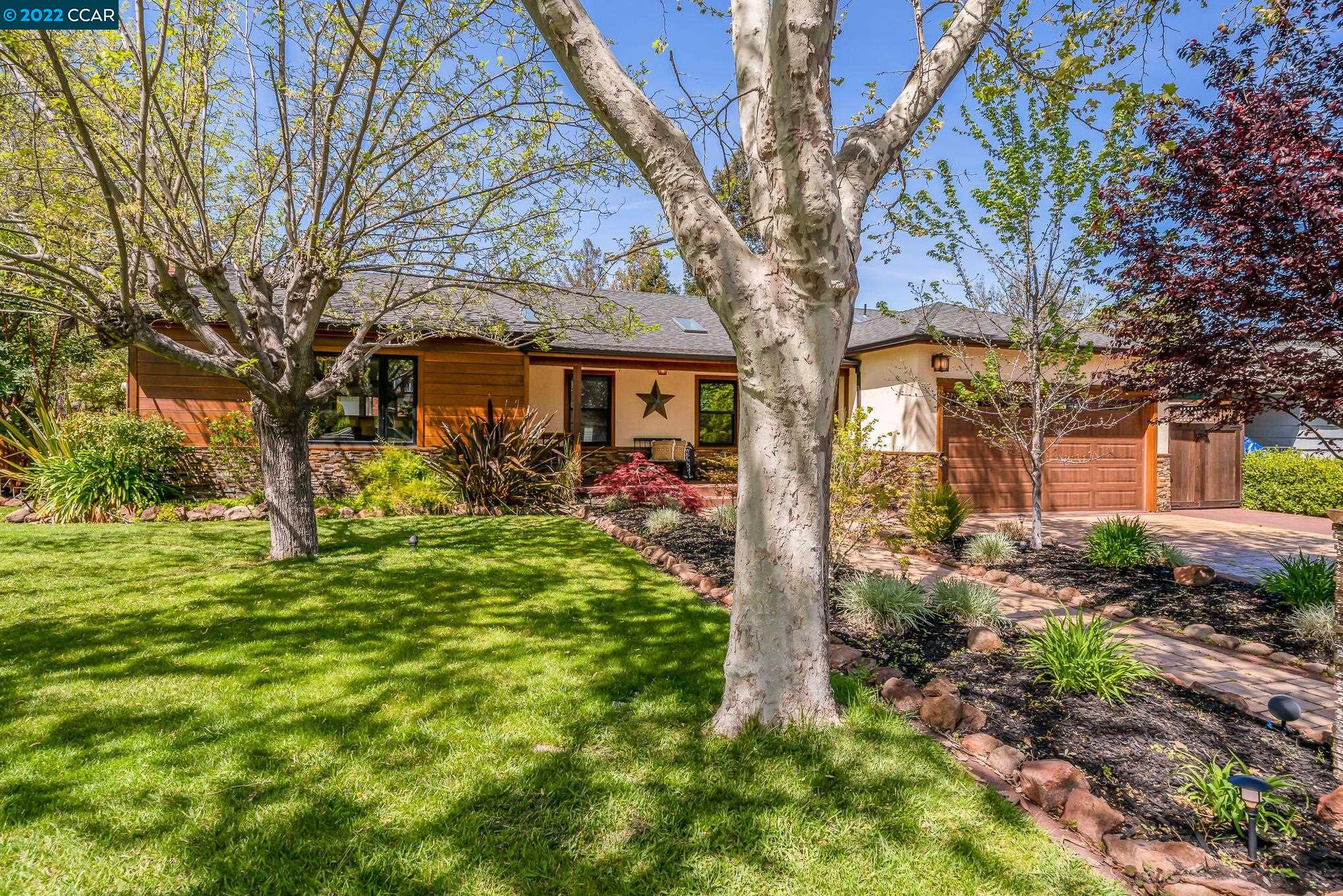 2923 Eccleston Avenue Walnut Creek, CA 94597 - Photo 1 of 1 a front view of a house with a garden