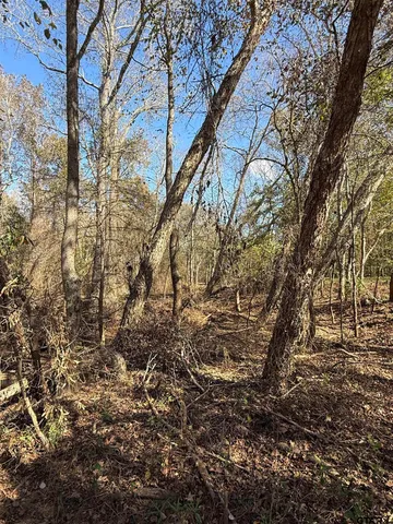a backyard of a house with outdoor seating