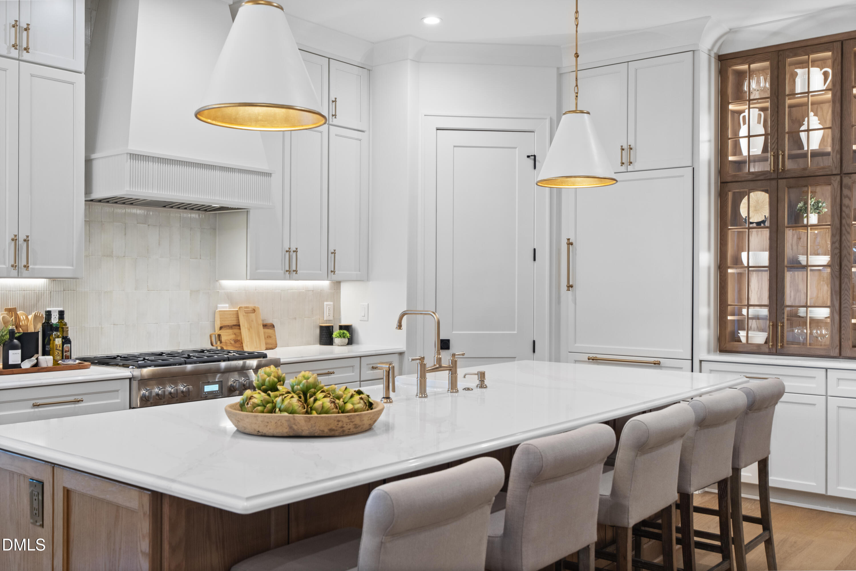 709 Mills Street Raleigh, NC 27608 - Photo 14 of 37 a kitchen with a dining table and chairs