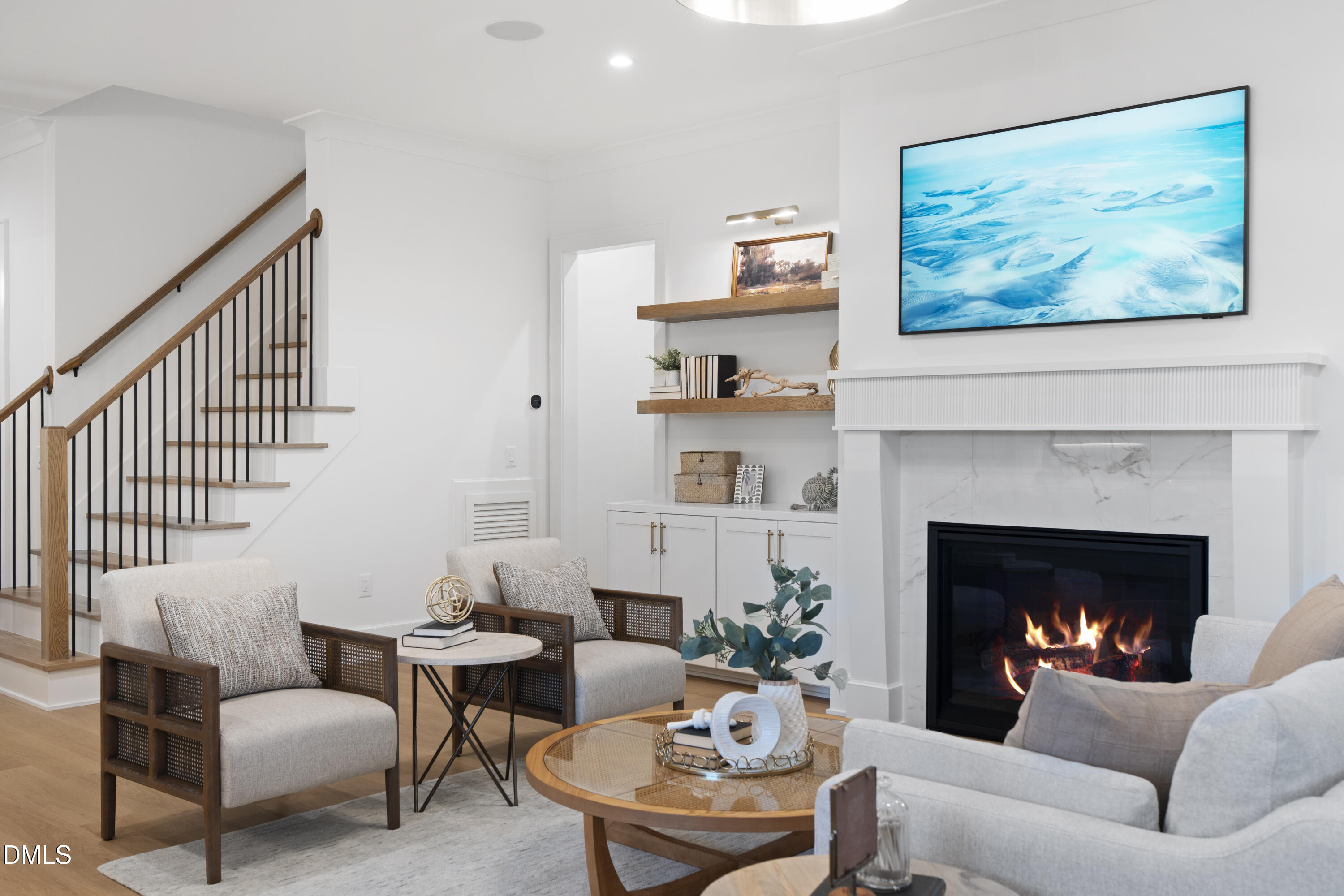 709 Mills Street Raleigh, NC 27608 - Photo 21 of 37 a living room with furniture and a fireplace