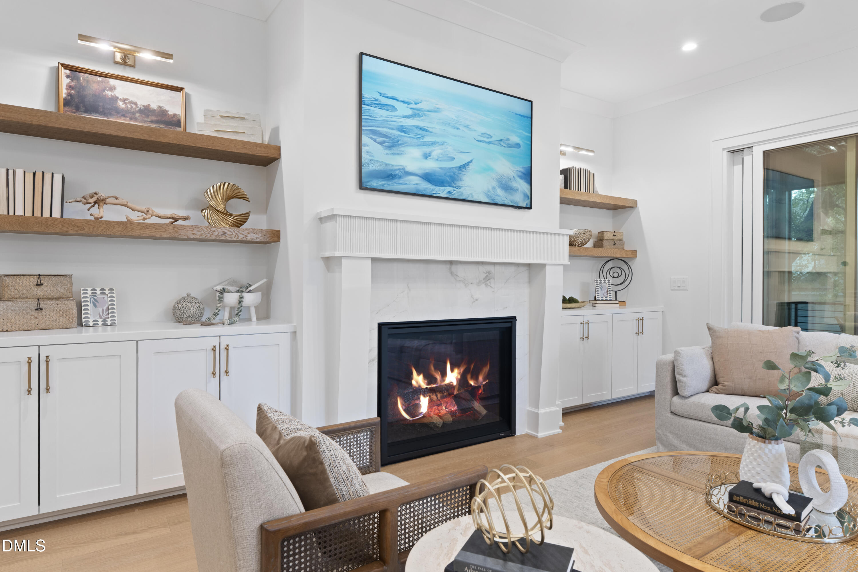 709 Mills Street Raleigh, NC 27608 - Photo 23 of 37 a living room with furniture and a fireplace