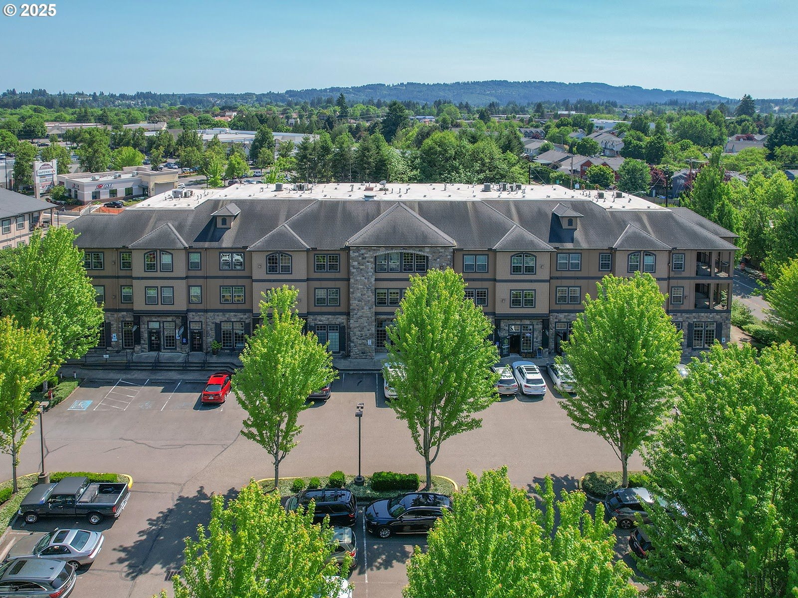 an aerial view of a house with a garden