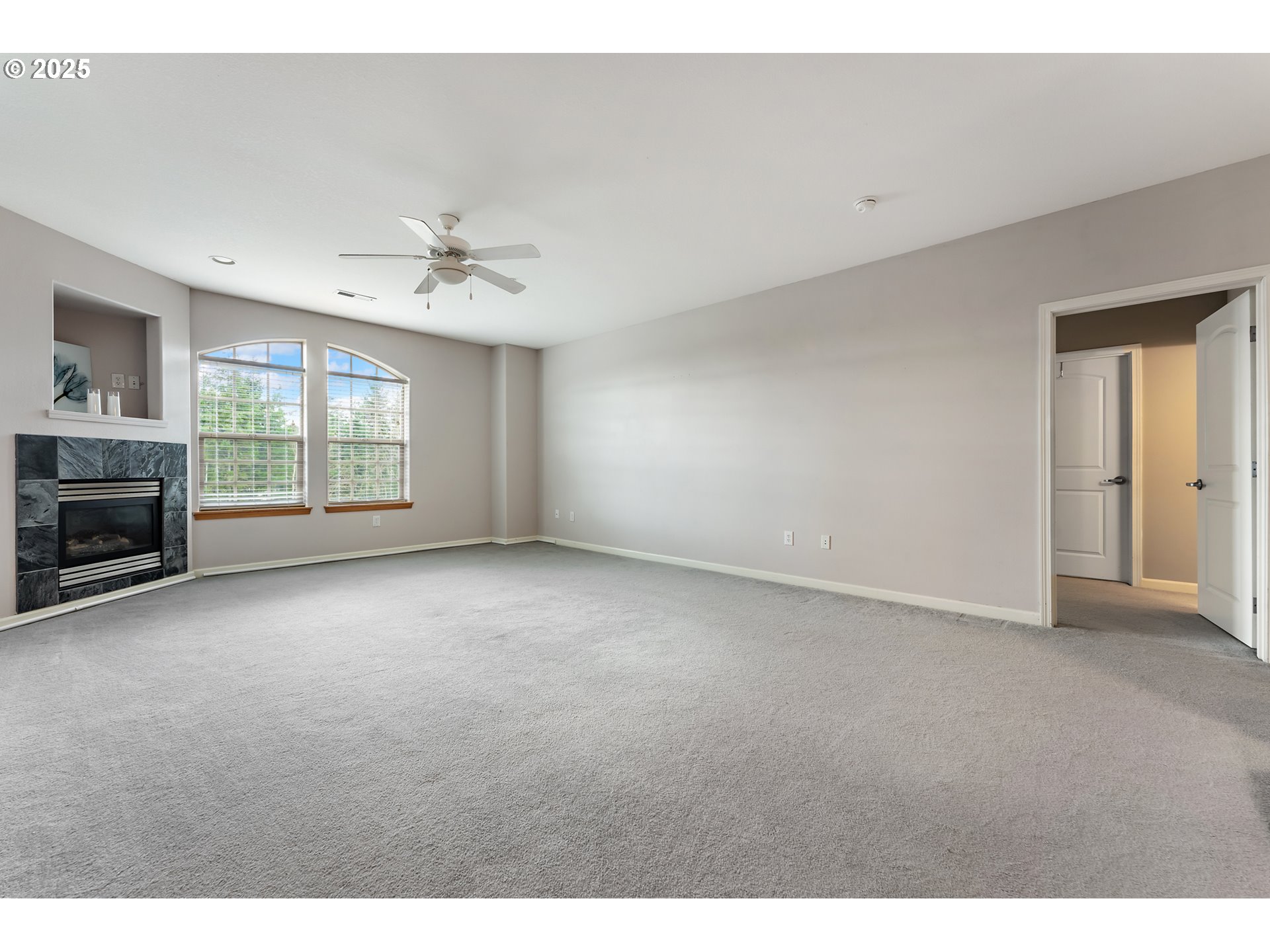 20508 Southwest Roy Rogers Road, Unit 328 Sherwood, OR 97140 - Photo 12 of 48 a view of an empty room with a window