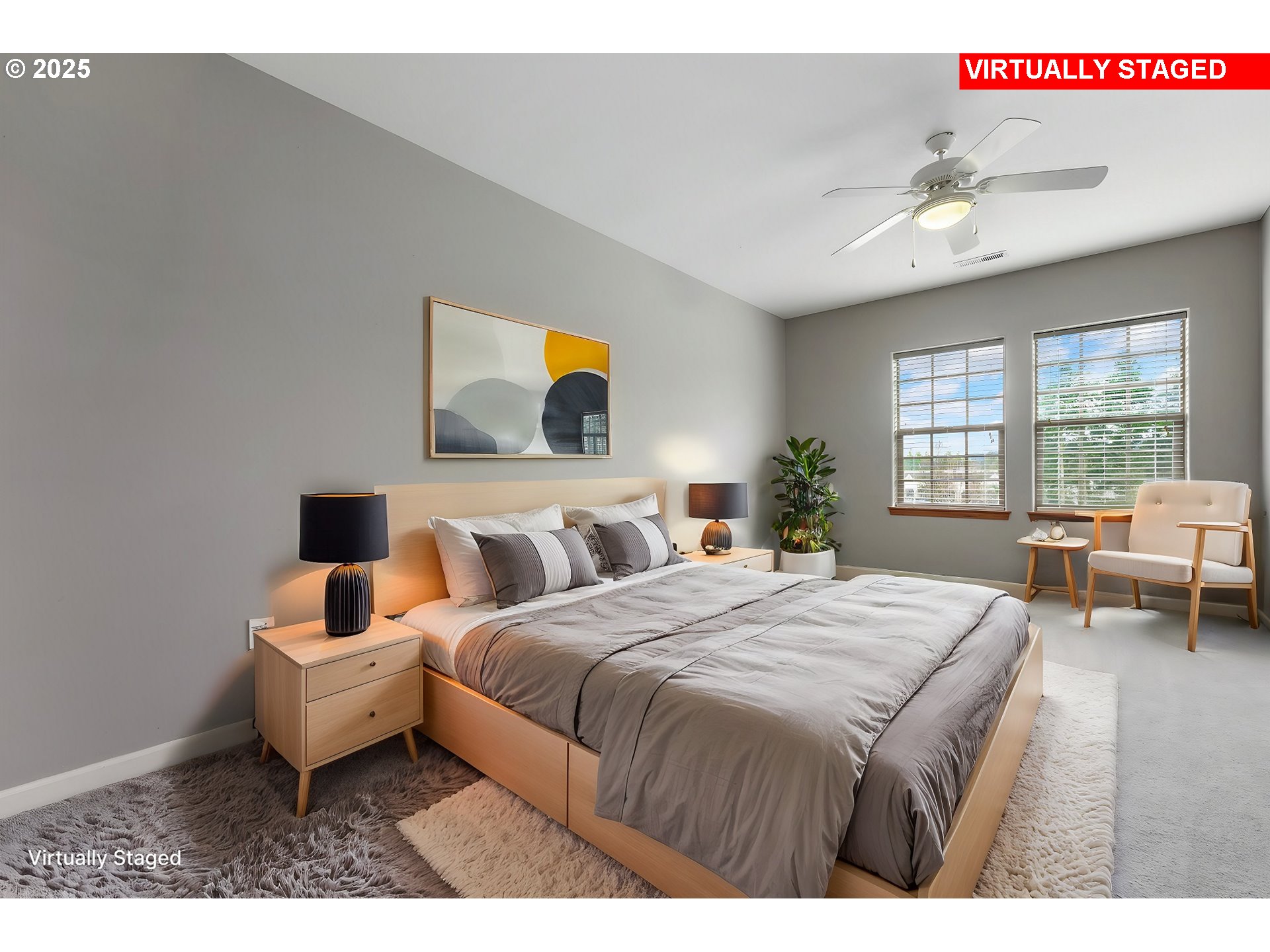 20508 Southwest Roy Rogers Road, Unit 328 Sherwood, OR 97140 - Photo 17 of 48 a bedroom with a bed a couch and potted plants with the wooden floor