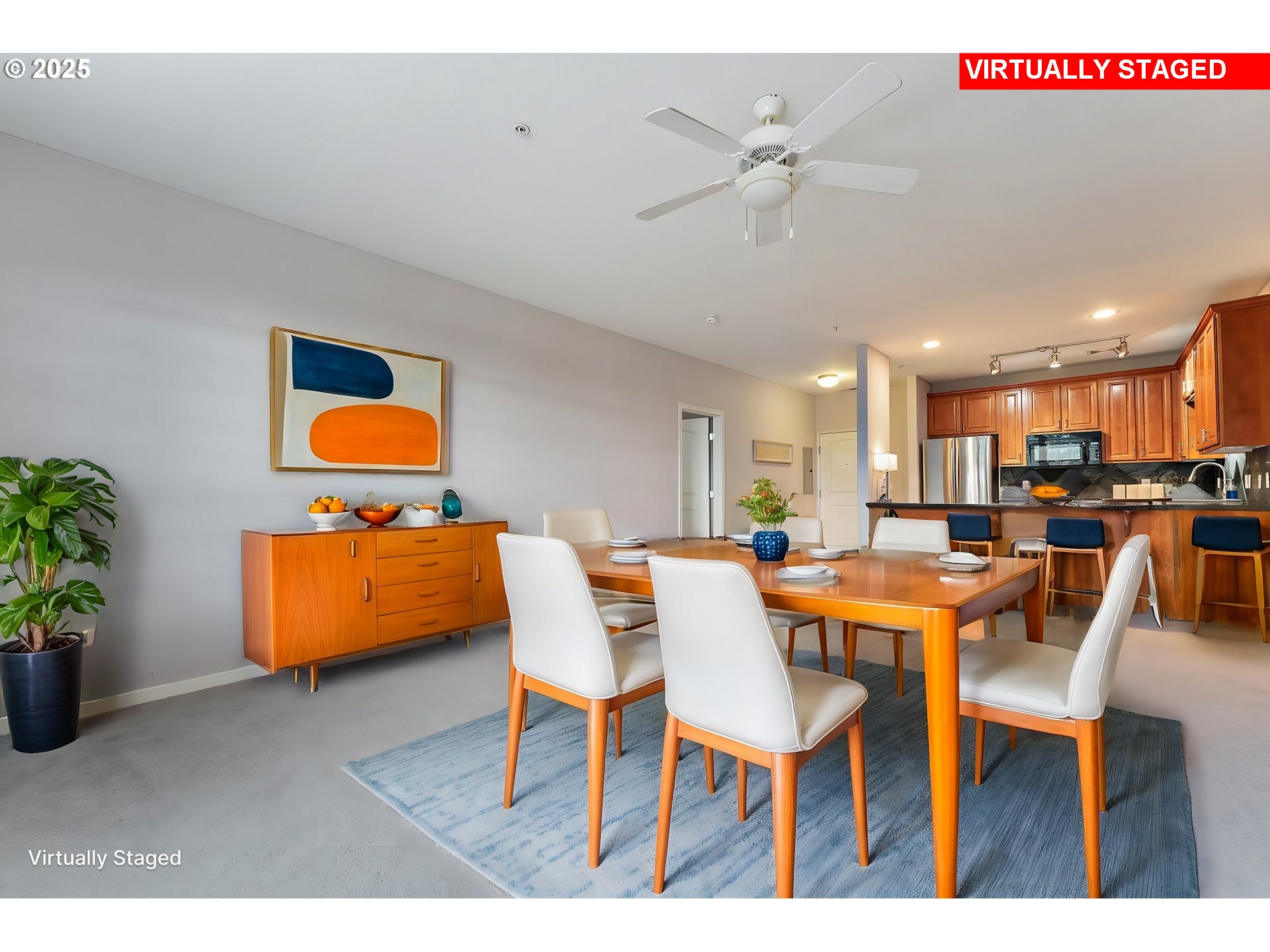 20508 Southwest Roy Rogers Road, Unit 328 Sherwood, OR 97140 - Photo 18 of 48 a view of a dining room with furniture and wooden floor
