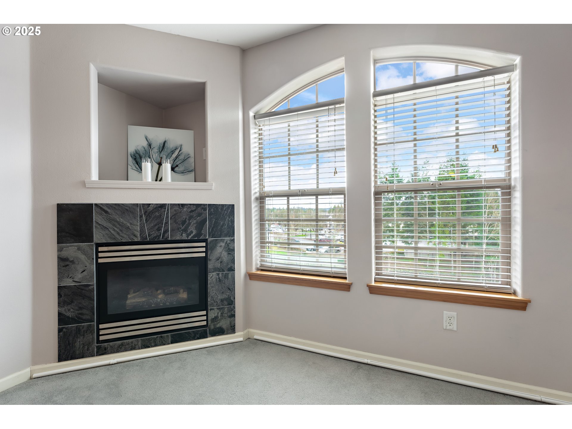 20508 Southwest Roy Rogers Road, Unit 328 Sherwood, OR 97140 - Photo 19 of 48 a living room with a fireplace and a window