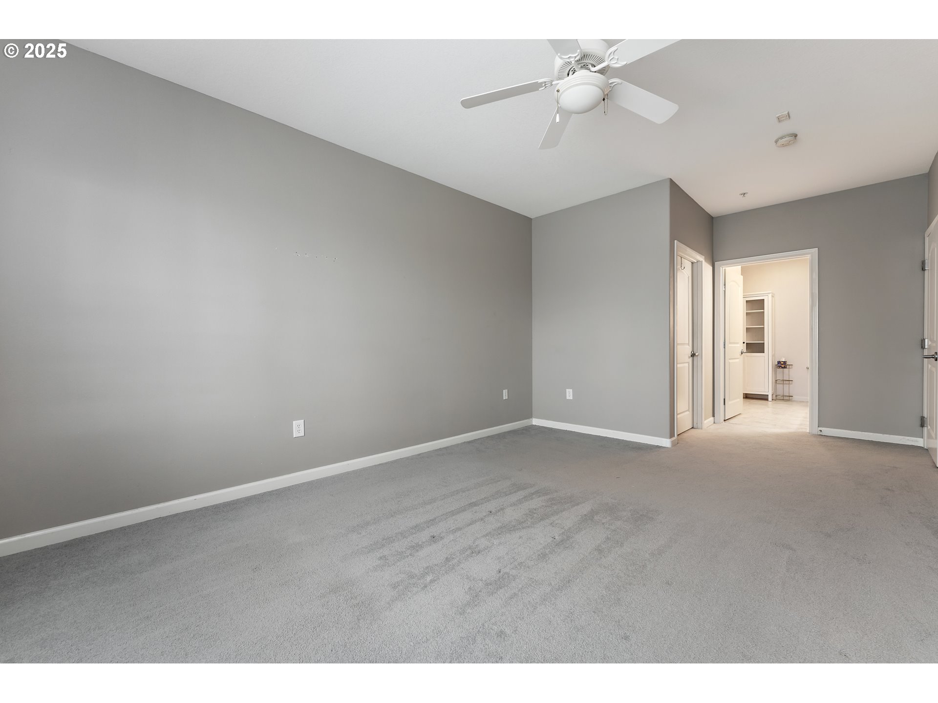 20508 Southwest Roy Rogers Road, Unit 328 Sherwood, OR 97140 - Photo 31 of 48 a view of an empty room and a ceiling fan