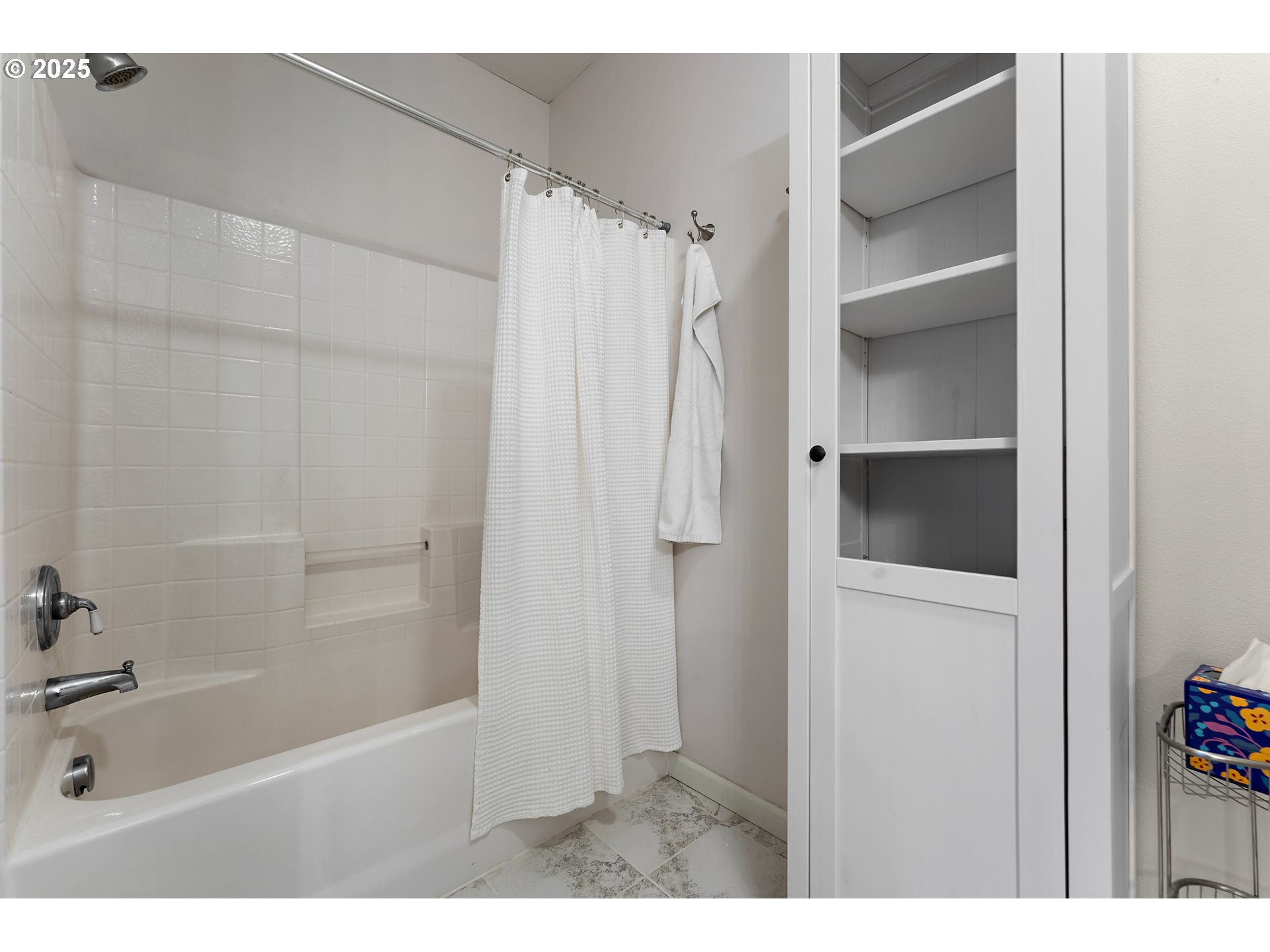 20508 Southwest Roy Rogers Road, Unit 328 Sherwood, OR 97140 - Photo 34 of 48 a bathroom with a shower and a tub