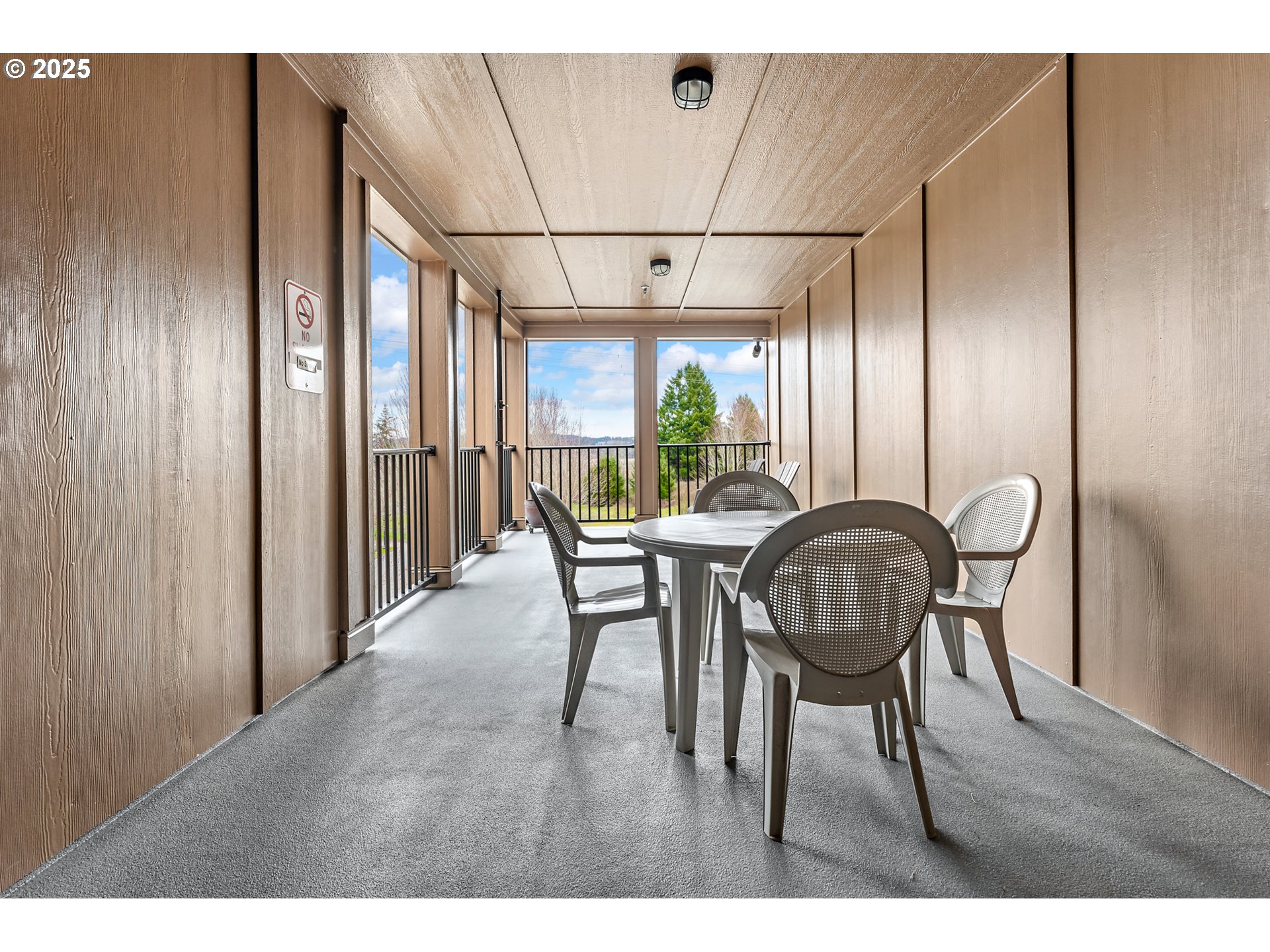 20508 Southwest Roy Rogers Road, Unit 328 Sherwood, OR 97140 - Photo 39 of 48 a dining room with furniture a window and wooden floor