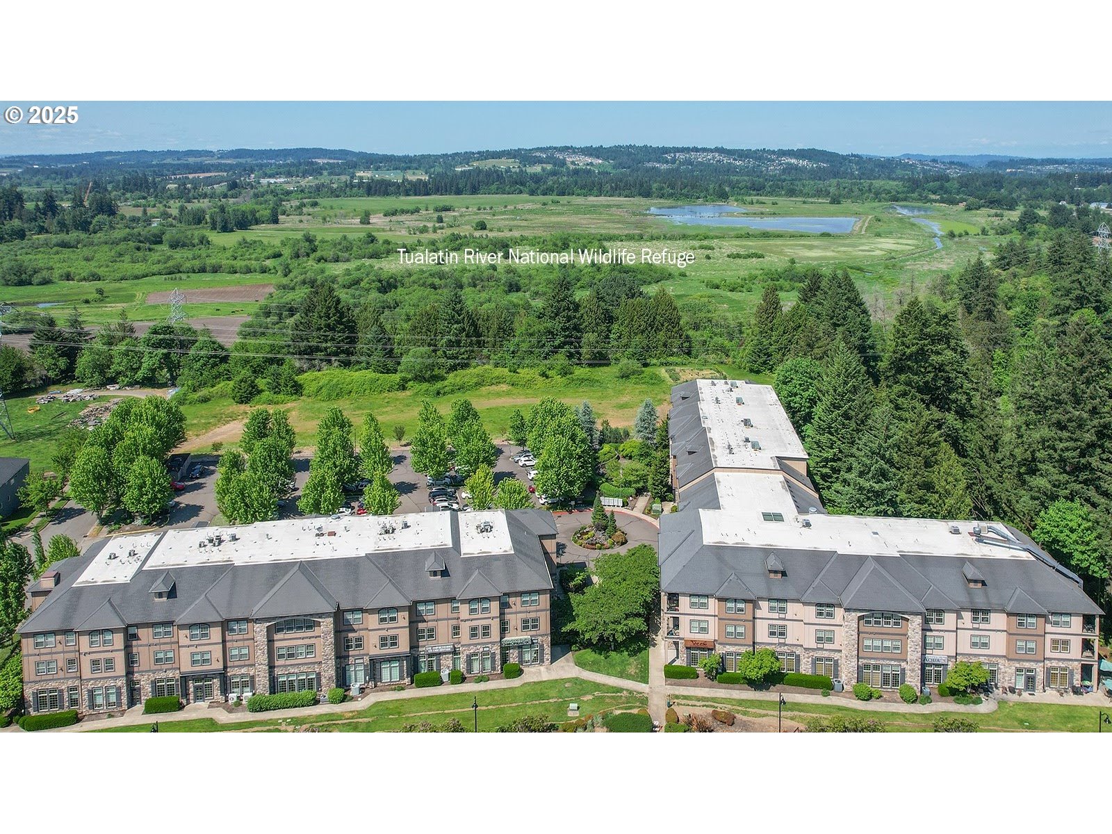 20508 Southwest Roy Rogers Road, Unit 328 Sherwood, OR 97140 - Photo 42 of 48 a view of a big house with a big yard
