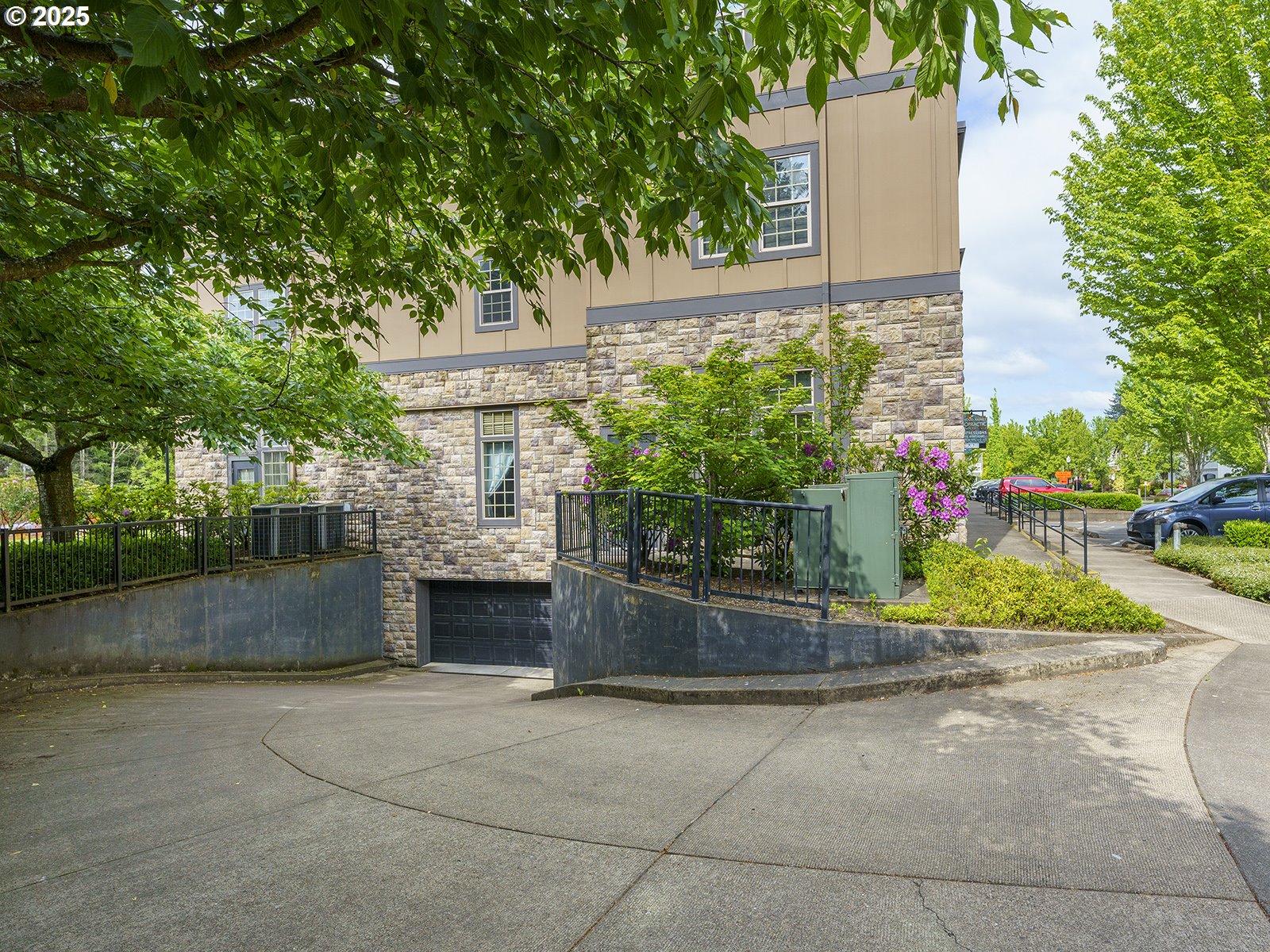 20508 Southwest Roy Rogers Road, Unit 328 Sherwood, OR 97140 - Photo 44 of 48 a front view of a house with a garden