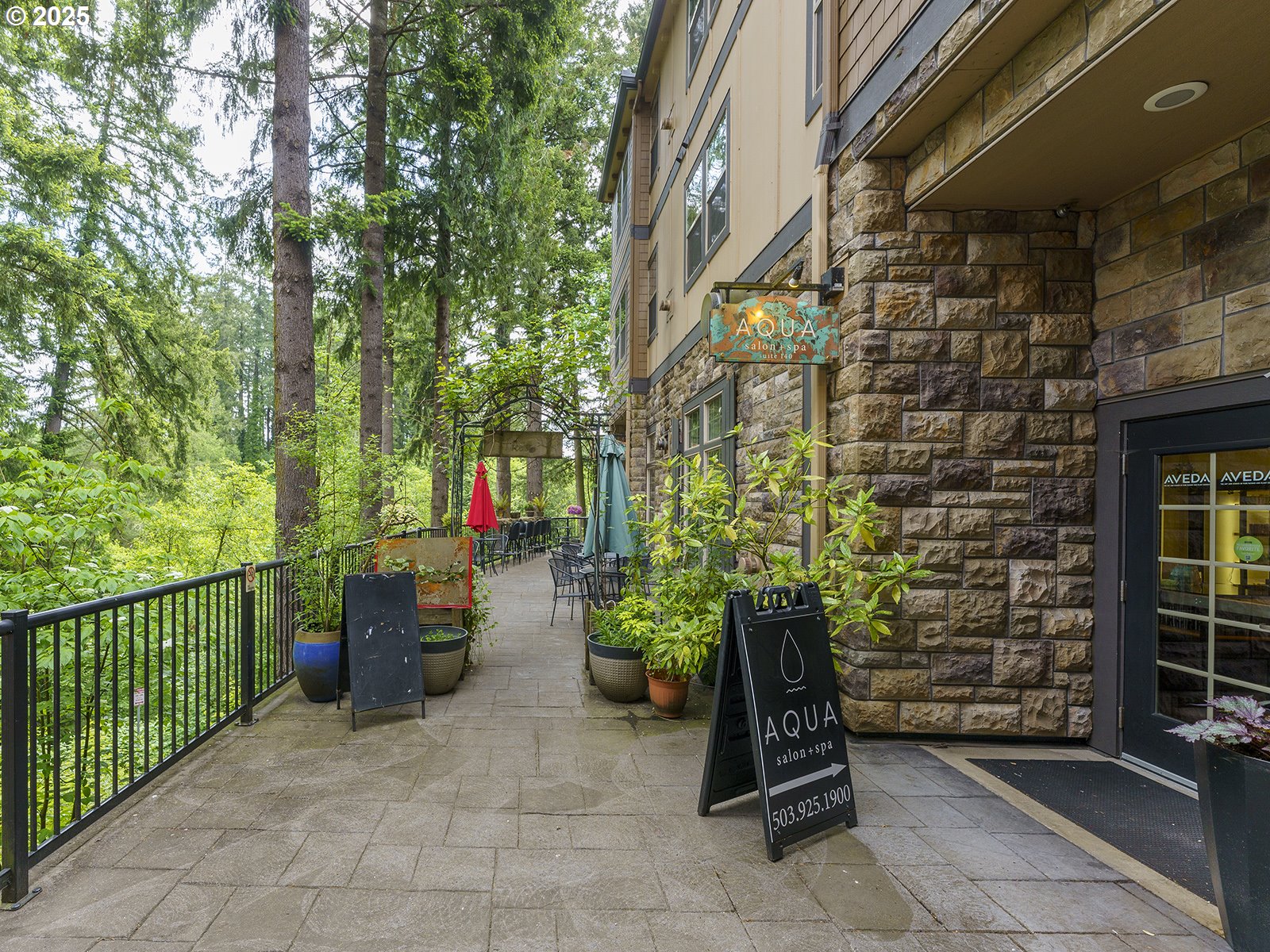 20508 Southwest Roy Rogers Road, Unit 328 Sherwood, OR 97140 - Photo 45 of 48 a view of a pathway with an outdoor seating