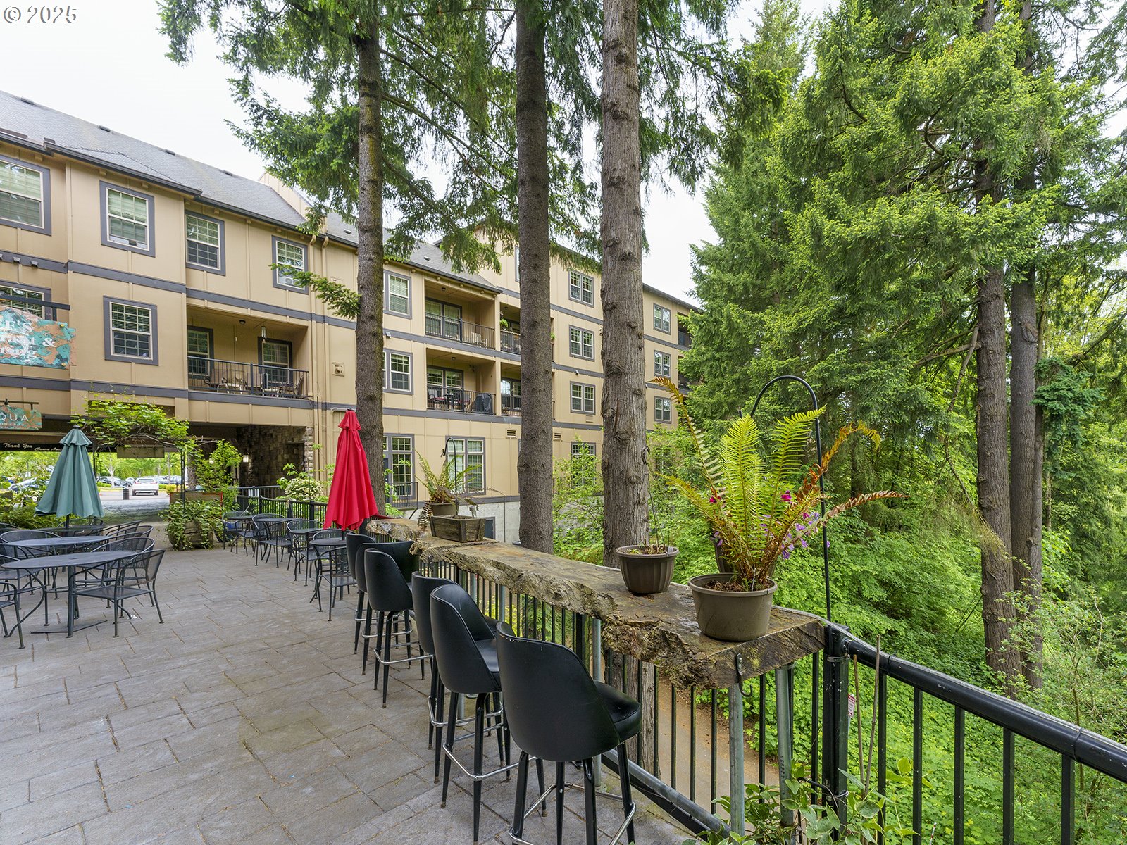 20508 Southwest Roy Rogers Road, Unit 328 Sherwood, OR 97140 - Photo 47 of 48 a view of a patio with table and chairs and wooden fence